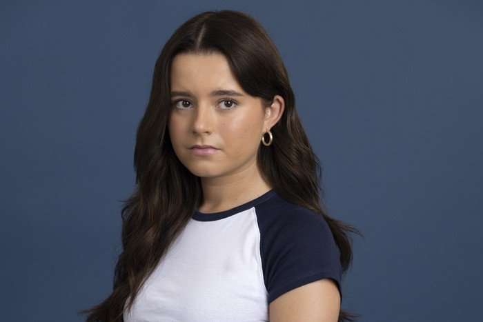 CORO_BETSY Betsy Swain looks sad against a dark blue background in key art for Coronation Street