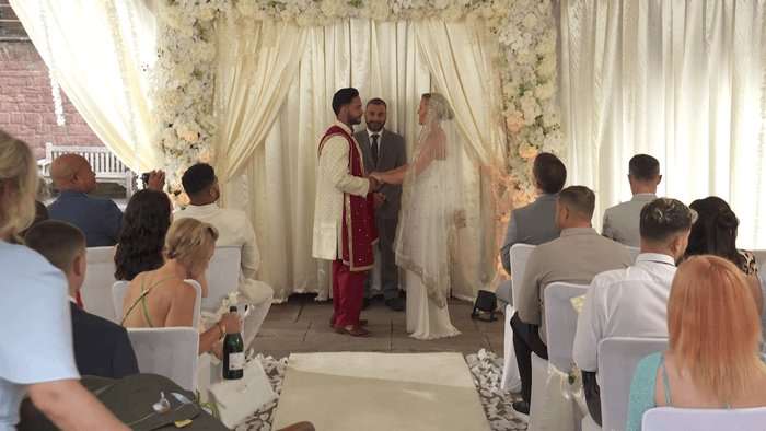 Imran and Leah get married in a scene from Hollyoaks