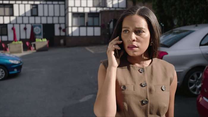 Gemma Johnson on the phone in the Dog in the Pond carpark in Hollyoaks