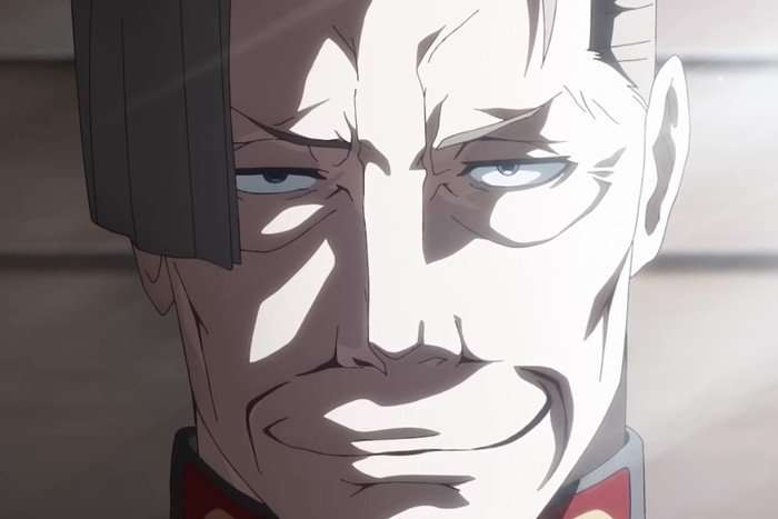 Tanya 3 An image of a man smirking at the camera in The Saga of Tanya the Evil season 2.