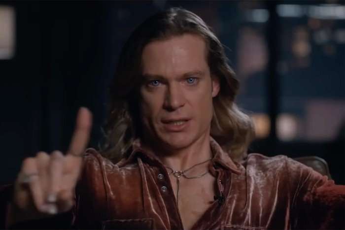 vampire-lestat Sam Reid as Lestat in The Vampire Lestat. He is shaking one finger in the air as if to dismiss or refuse something, with a serious expression on his face